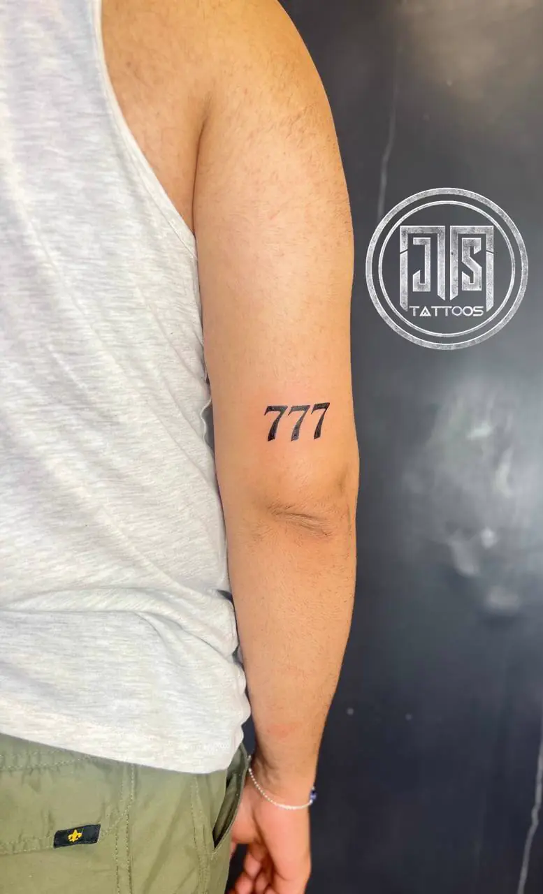 777 symbol minimal tattoo Paschim Vihar West Delhi studio